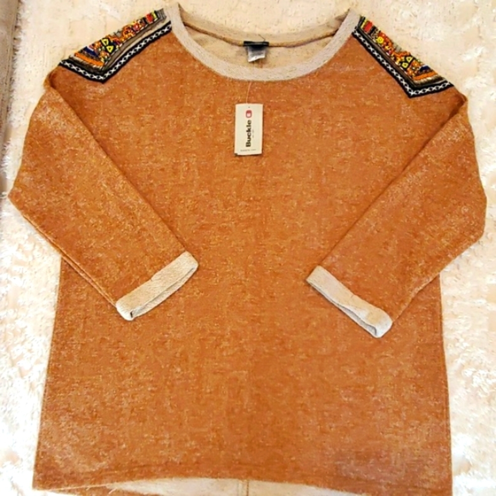 Tan, detailed top by buckle